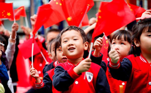 Crianças na comemoração do Dia Nacional da China  por China Out/AFP 