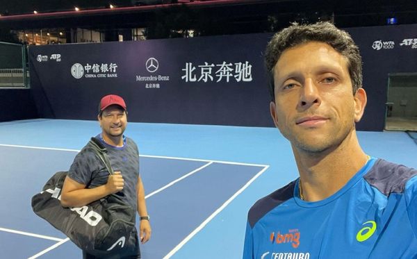 Marcelo Melo (à dir.), ao lado do irmão e treinador, Daniel Melo