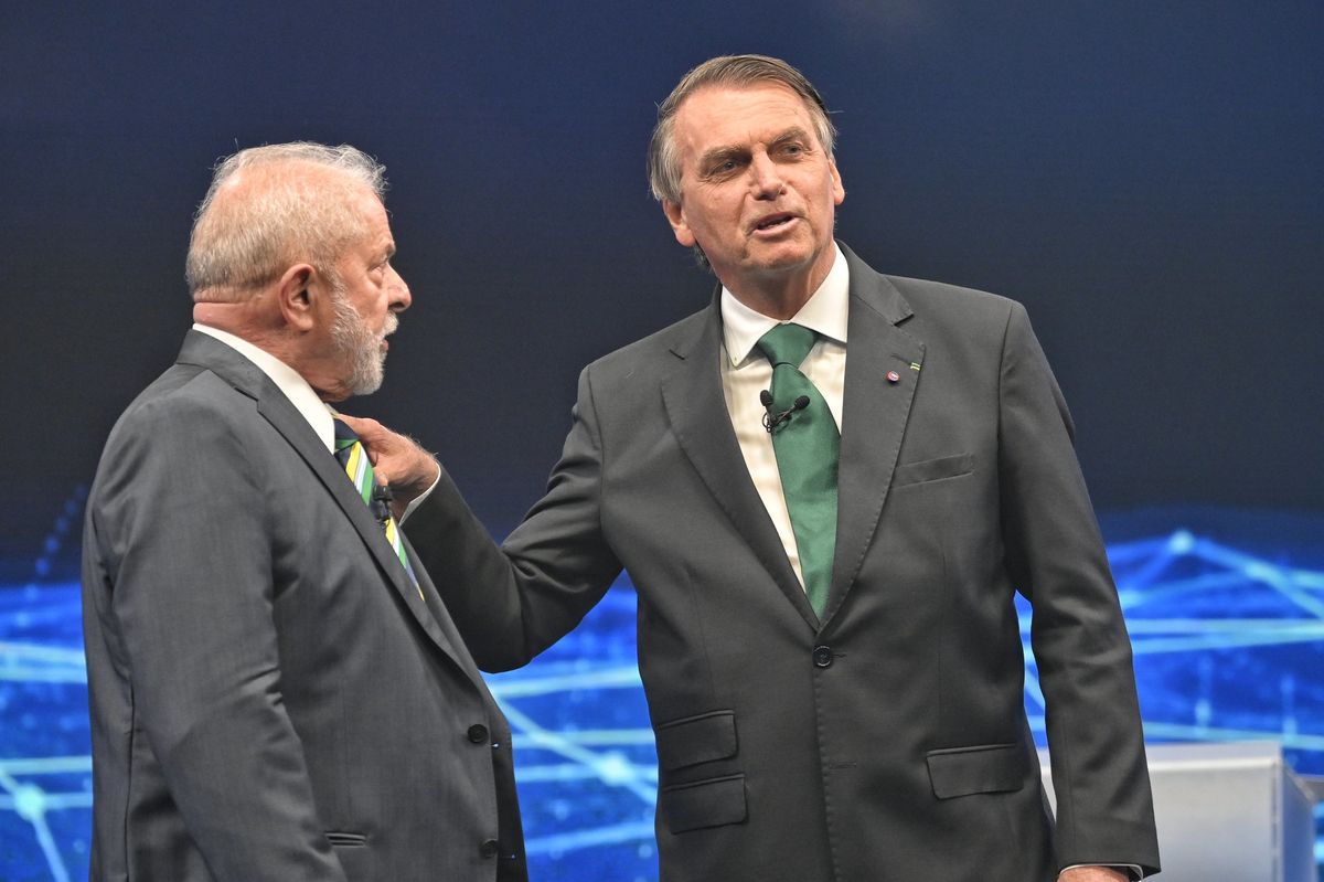 Presidente Lula e ex-presidente Bolsonaro no debate da Band