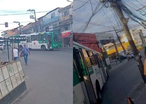 Ônibus atravessados em via do bairro de Tancredo Neves por Reprodução