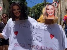 Imagem - 'Brigou tem que usar': foliões se fantasiam de Ivete e Claudia usando 'camiseta da união' em Salvador