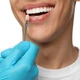 Imagem - Lente nos dentes causa 'bafo de cocô'? Entenda a polêmica e o que fazer
