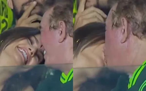 Amado Batista e esposa em estádio