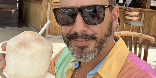 André Marques  por Reprodução