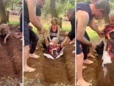 Imagem - Simulação do próprio enterro: ritual sepulta pessoas vivas em retiro espiritual