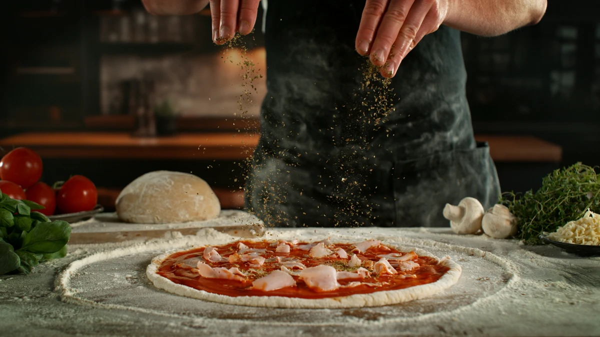 Preparando pizza por Shutterstock