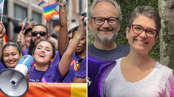 Sofia na parada gay e os pais, os jornalistas Sandra Annenberg e Ernesto Paglia por Reprodução