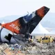 Imagem - Pilotos desligaram motor errado em acidente de avião que deixou 179 mortos, diz investigação