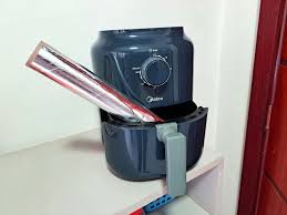 Pode usar papel alumínio na airfryer? por Reprodução