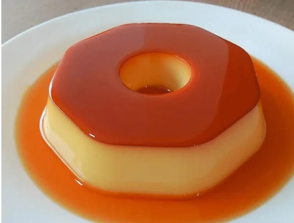 Pudim de leite condensado perfeito e sem furinhos por Reprodução