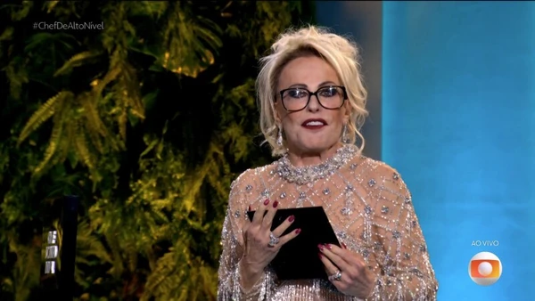 Apresentadora mostra o nome de Luiz Lira ao abrir a caixa por Reprodução/TV Globo