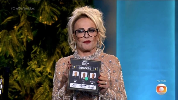Apresentadora mostra o nome de Luiz Lira ao abrir a caixa por Reprodução/TV Globo