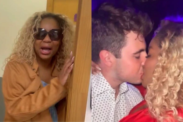 Cariúcha e filho de Gugu deram beijão em festa da firma