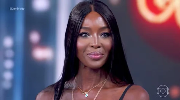 Cauã Reymond e Naomi Campbell por Reprodução/TV Globo