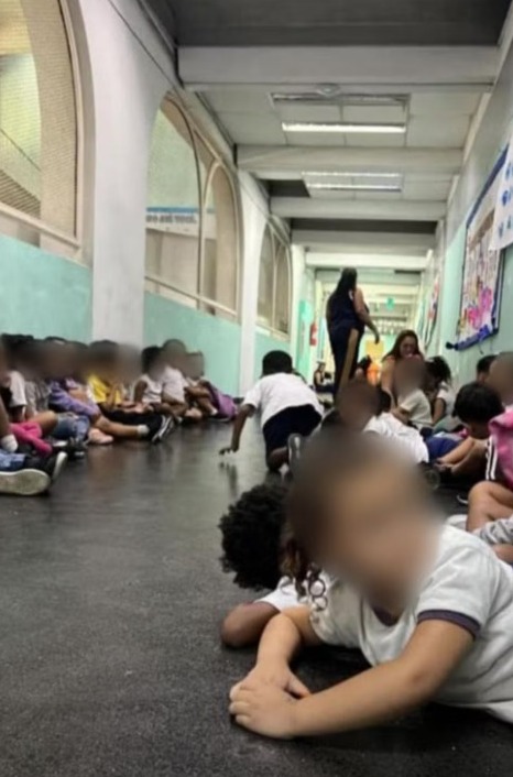 Durante o tiroteio, crianças de uma escola municipal deitaram no chão para se proteger por Reprodução