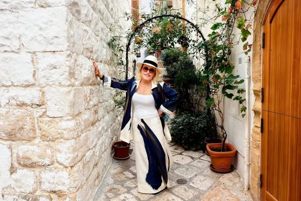 Ana Maria Braga curte férias com o marido por Reprodução