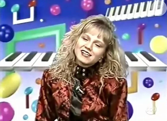 Sessão Desenho (SBT, 1991–1993) - Após o fim do Festolândia, Eliana passou a apresentar blocos de desenhos animados, criando vínculo com o público infantil. por Reprodução