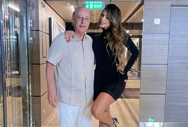 Clara Brasil, de 32 anos e Marco Polo Del Nero, 84 por Reprodução