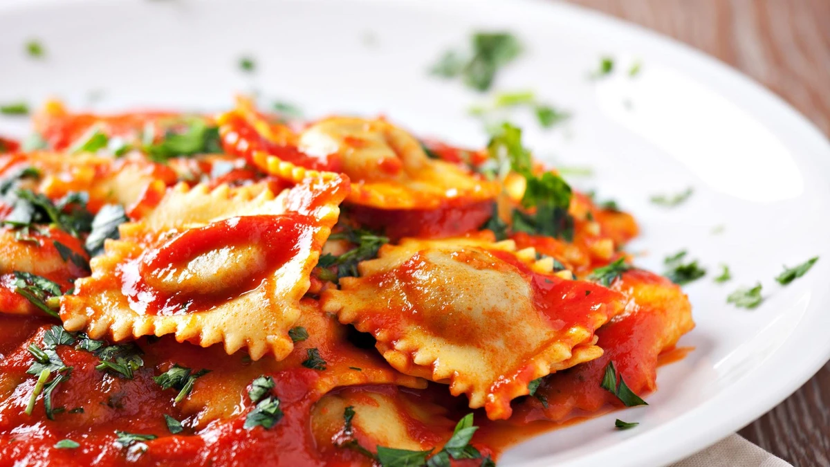 Ravioli ao sugo por Reprodução