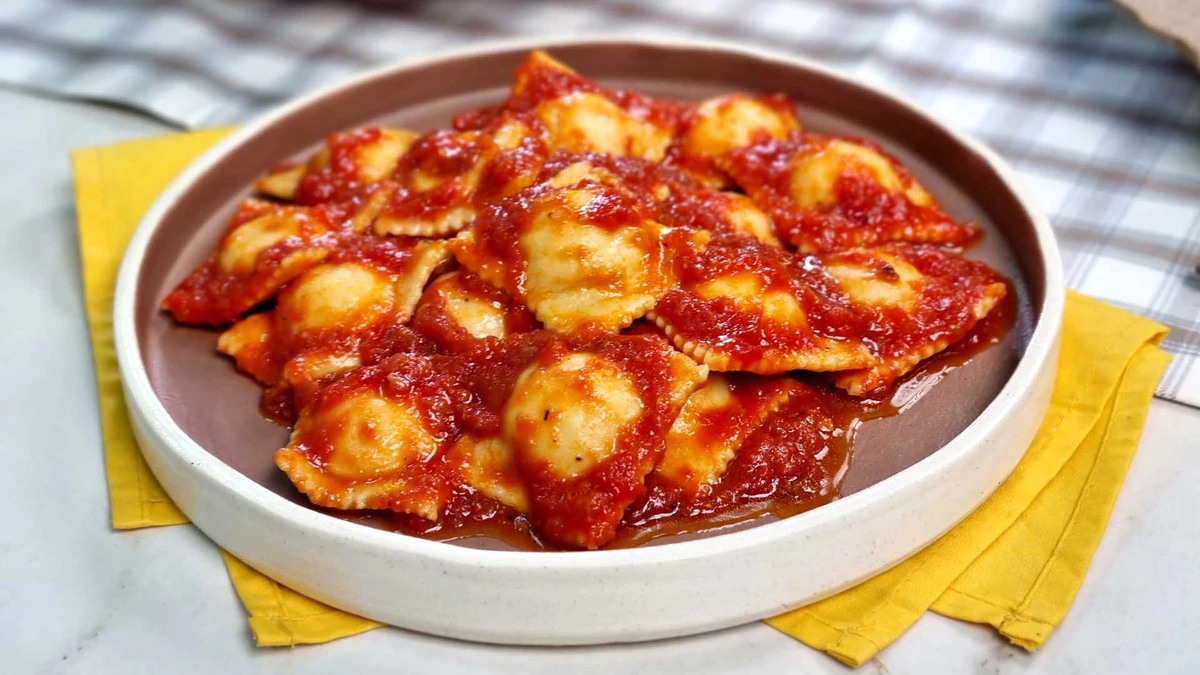 Ravioli ao sugo por Reprodução