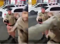 Imagem - Policial militar dá tapa na cara de homem durante protesto em Salvador