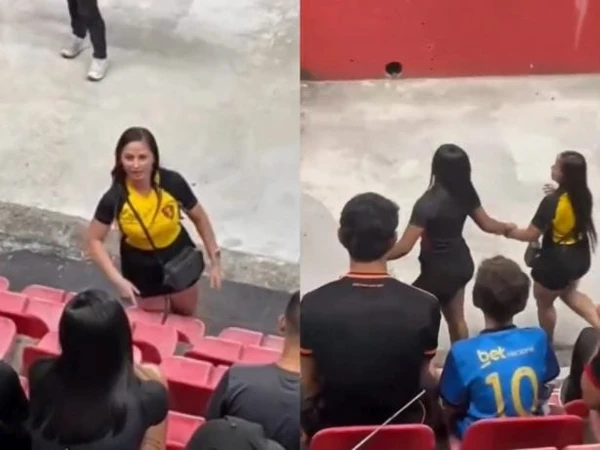 Mulher flagra traição durante jogo de futebol por Reprodução