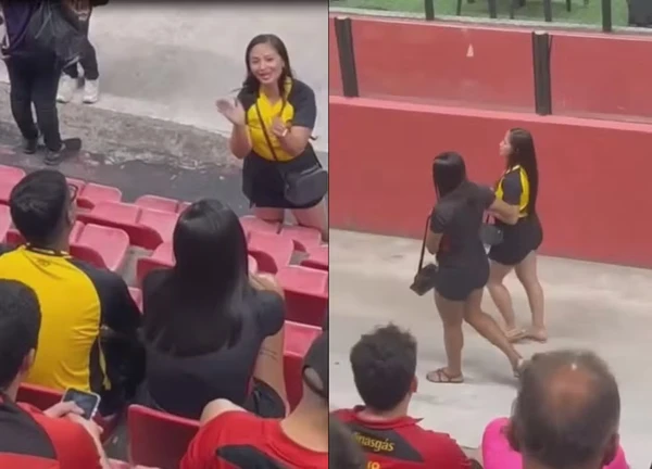 Mulher flagra traição durante jogo de futebol
