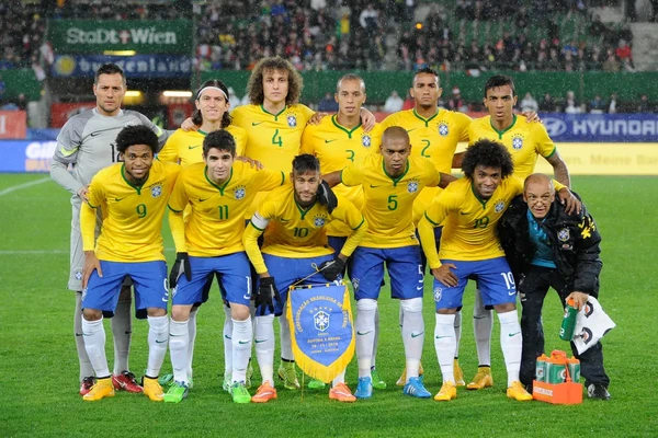 Oscar com jogadores da seleção