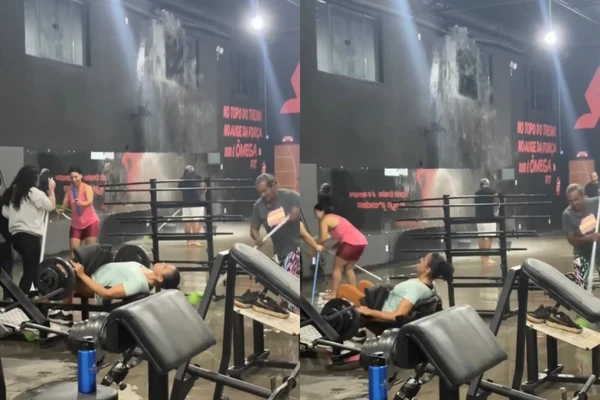Mulher continua treino em academia alagada e viraliza na Bahia