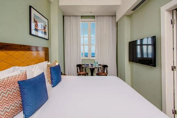 Acomodações do Fera Palace Hotel por Reprodução/Booking.com