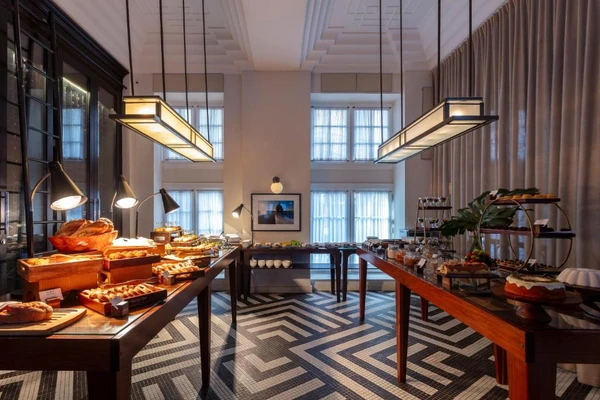 Acomodações do Fera Palace Hotel por Reprodução/Booking.com