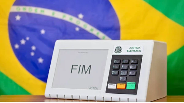 Urna Eletrônica por Fonte: Banco de Imagens do TSE