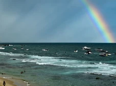 Imagem - Sexta-feira de Carnaval tem arco-íris iluminando o circuito Barra-Ondina