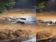 Imagem - Temporal mata seis pessoas e arrasta caixões de funerária durante enchente em cidade mineira