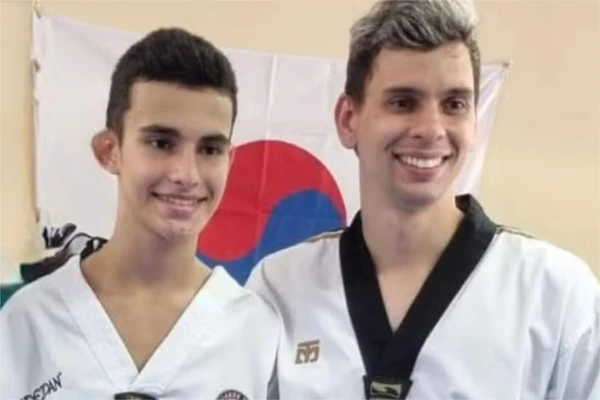 Cauã Batista e o treinador Luan por Divulgação