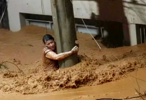 Edna Silva sobreviveu agarrada a poste