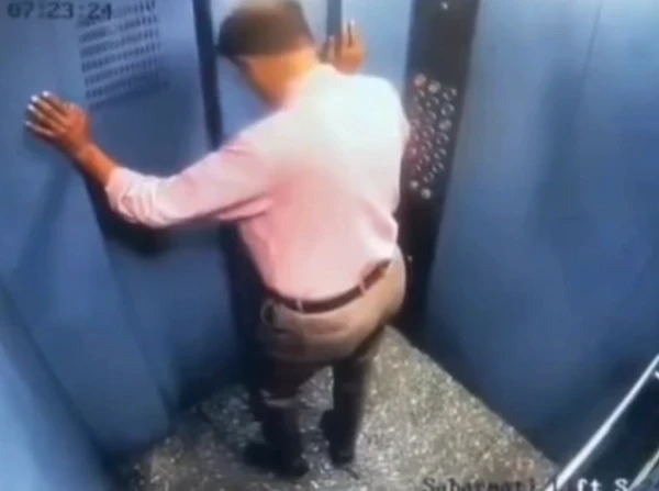 Homem escapa de ser esmagado em elevador na Índia por Reprodução