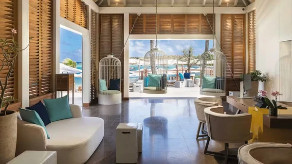 Ainê e Phillippe Coutinho curtem férias em resort luxuoso por Reprodução