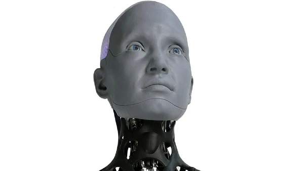 Ameca (2022), da Engineered Arts: humanoide social com expressões faciais avançadas e foco em interação por Willy Jackson / Wikimedia Commons