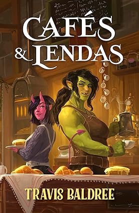Cafés & Lendas, de Travis Baldree (Intrínseca). Fenômeno do TikTok, uma alta fantasia de baixíssimo perigo em que uma orc decide mudar de vida e encontra pelo caminho uma verdadeira família e um novo amor por Reprodução