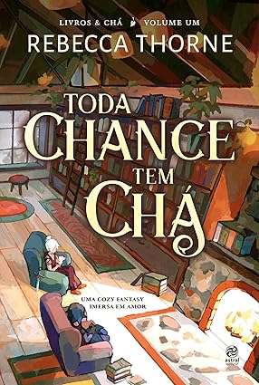 Toda chance tem chá, de Rebecca Thorne (Astral Cultural). Tudo o que Reyna e Kianthe desejam é abrir uma livraria que sirva um delicioso chá, em um lugar acolhedor, com direito a assoalho de madeira, luzes amareladas e plantas por toda a parte. Mas esse sonho parece estar bem longe de se tornar realidade — afinal, Reyna trabalha na Guarda Real de uma rainha tirana e Kianthe é a Maga mais poderosa que existe.Porém, depois de ser feita como refém por um assassino, Reyna percebe quanto está cansada de arriscar a própria vida por uma rainha egocêntrica. Enquanto isso, Kianthe só está esperando uma chance de fugir de todas as responsabilidades provenientes de seu grande poder. Então, juntas, ambas fogem e se estabelecem em Tawney, uma cidade gelada, perto da terra dos dragões, e finalmente abrem a livraria dos sonhos. por Reprodução