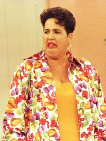 Claudia Jimenez como Edileuza em Sai de Baixo por Reprodução