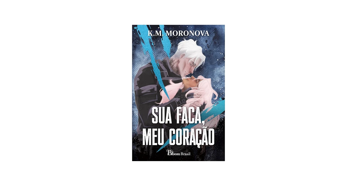 Sua faca, meu coração, de K. M. Moronova (Bloom Brasil). Cameron Mortem tem um problema: é viciado em matar seus parceiros. Ele já era uma das peças mais mortais das Tropas Ocultas, mas uma droga experimental destruiu seu autocontrole, transformando-o em uma bomba-relógio sempre que precisa dividir campo com alguém. Como punição, é jogado de volta nos Testes do Sub, um treinamento impiedoso feito para quebrar os fracos e lapidar os implacáveis.A única ordem? Não mate a garota nova.Emery Maves escapa por um triz de uma sentença de morte por crimes brutais, mas acaba em outro tipo de inferno. Designada como dupla de Cameron, ela deve sobreviver aos Testes… e à instabilidade do parceiro. Só que Emery logo percebe que existe mais nele do que sangue e um rastro de mortes. Por baixo da loucura, há um magnetismo aterrador… e uma ternura estranhamente perigosa. Lançamento em 2 de junho.  por Reprodução