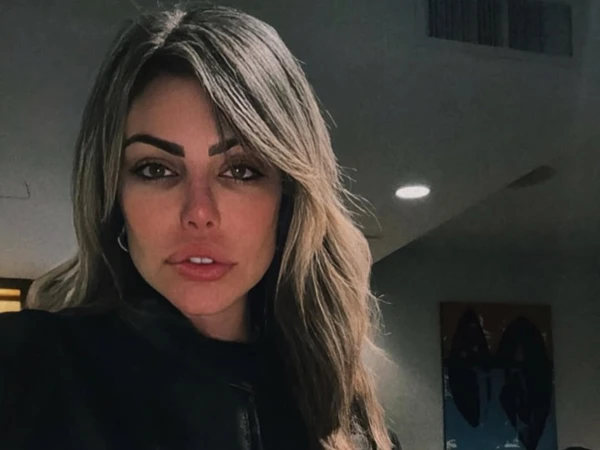 Liziane Gutierrez  por Reprodução